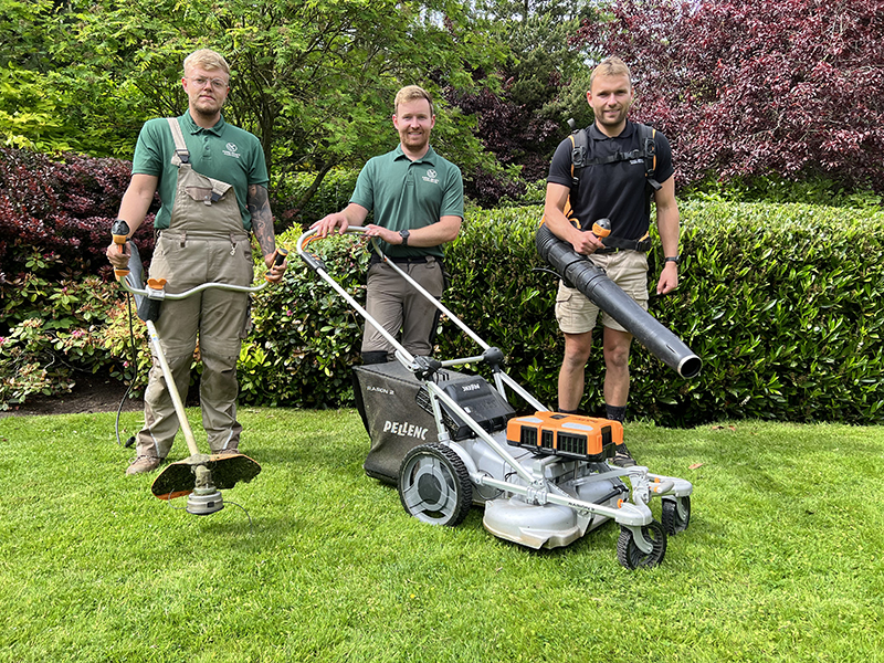 Staff from HArd Graft Garden Services with Pellenc equipment